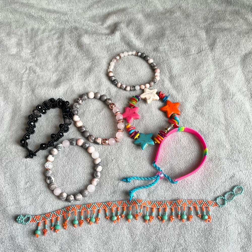 7 pc accessories. 6 bracelet 1 anklet